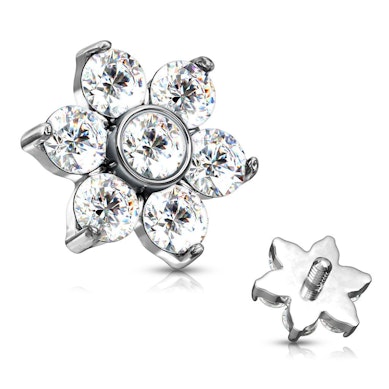 Dermal Anchor mit einer Blume geformt aus Steinen