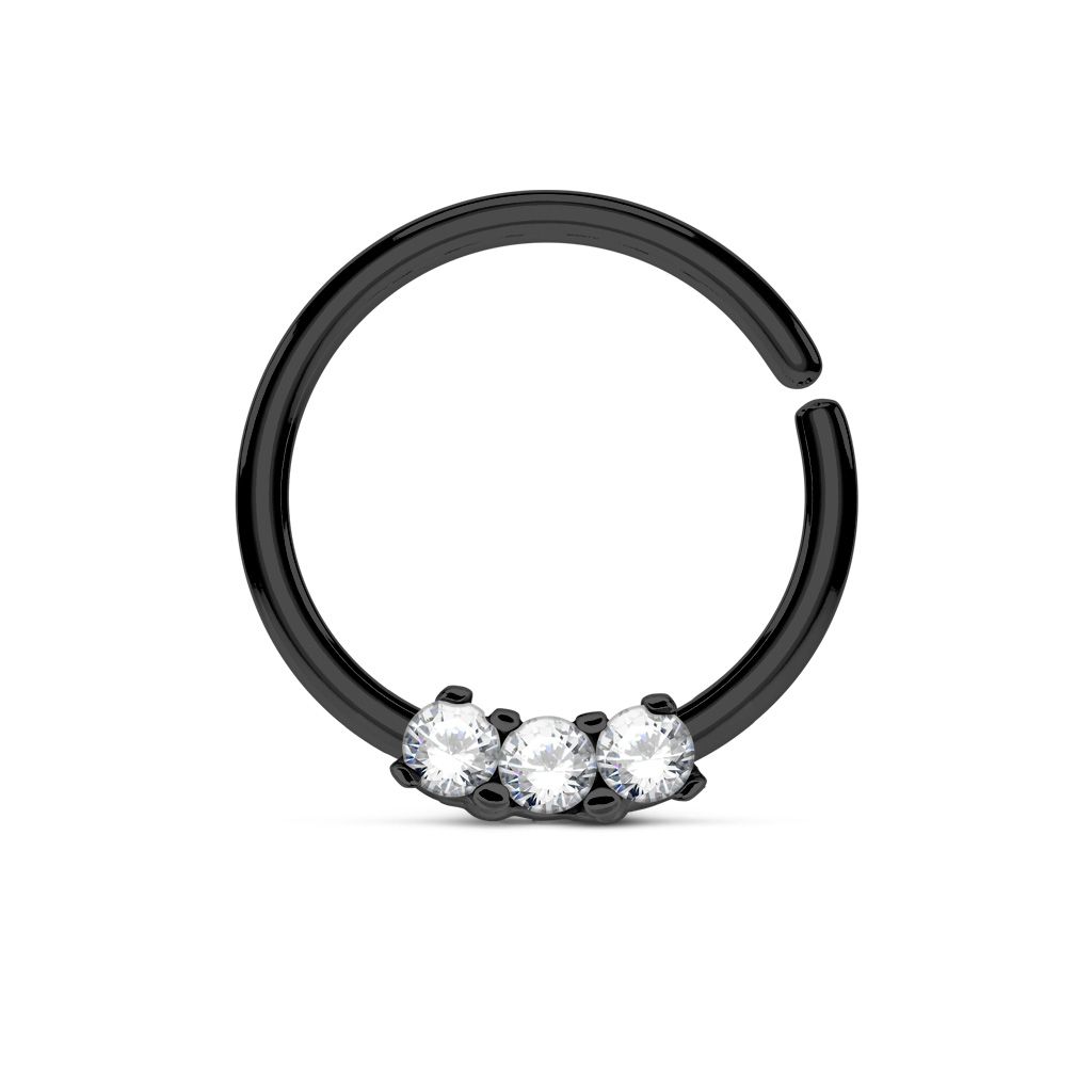 Kleines Septumpiercing mit drei kleinen Steinen