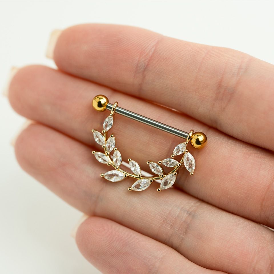 Brustwarzenpiercing mit Blättern aus Steinen