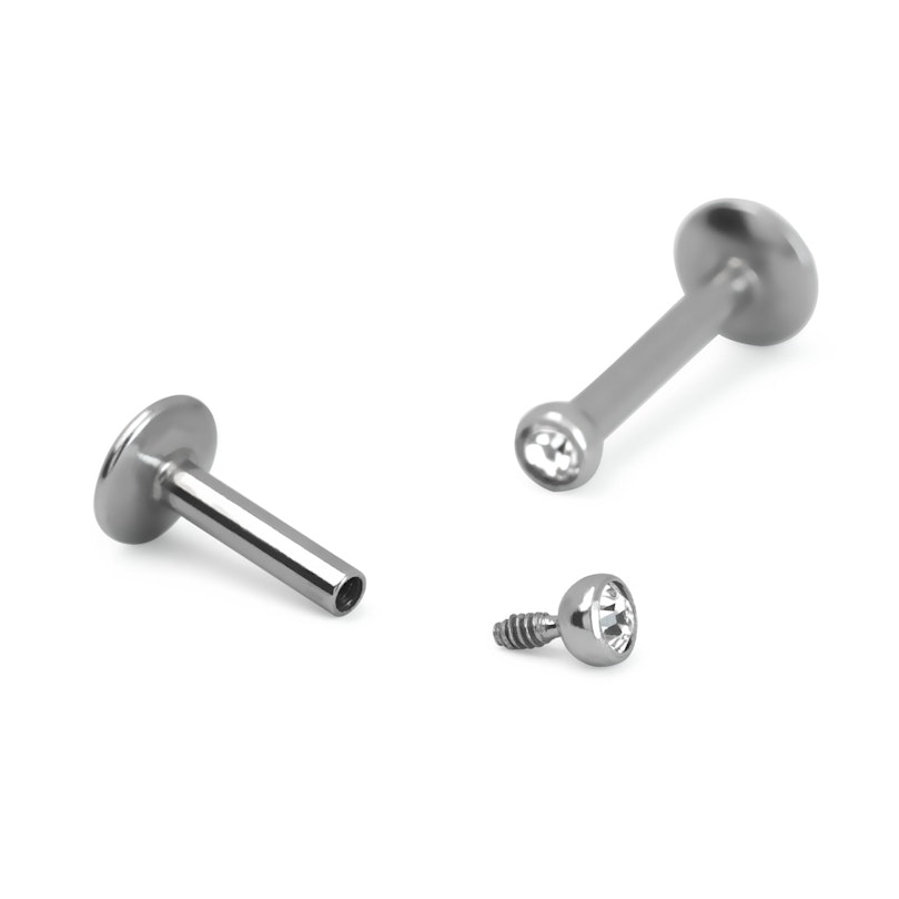 Labret mit einem kleinen Stein und innenseitigen Gewinde Piercingschmuck - Deutschland