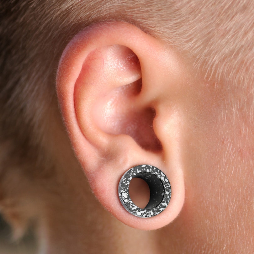 Tunnel mit Spritzflecken und Schraubgewinde Körperpiercing - Deutschland