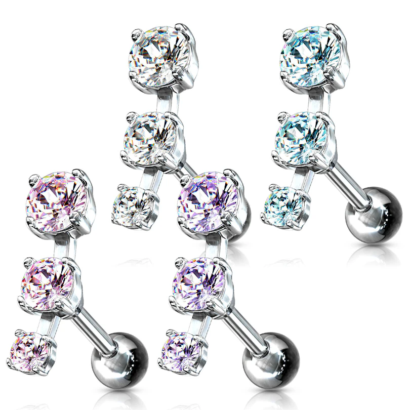 Ohrpiercing mit drei Steinen in einer Reihe