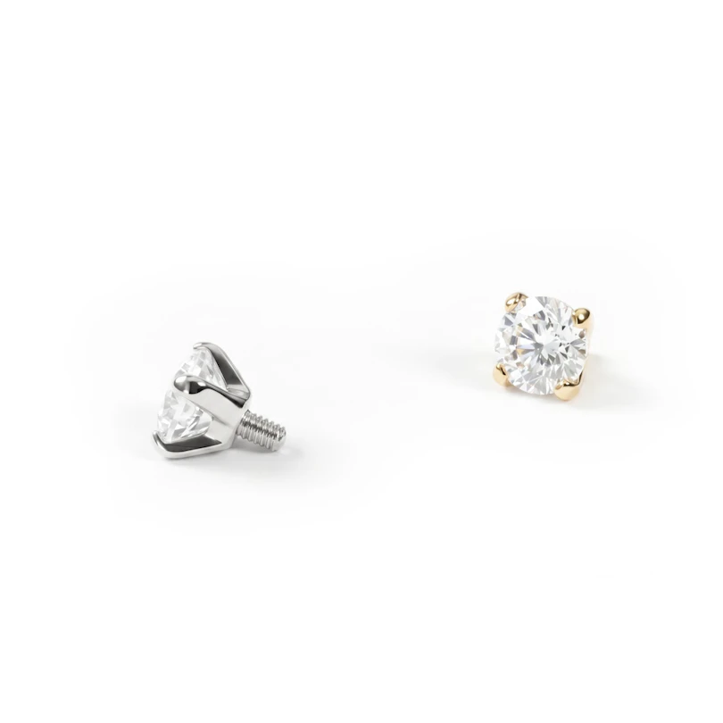 Dermal aus 14 Karat Gold mit einem Stein