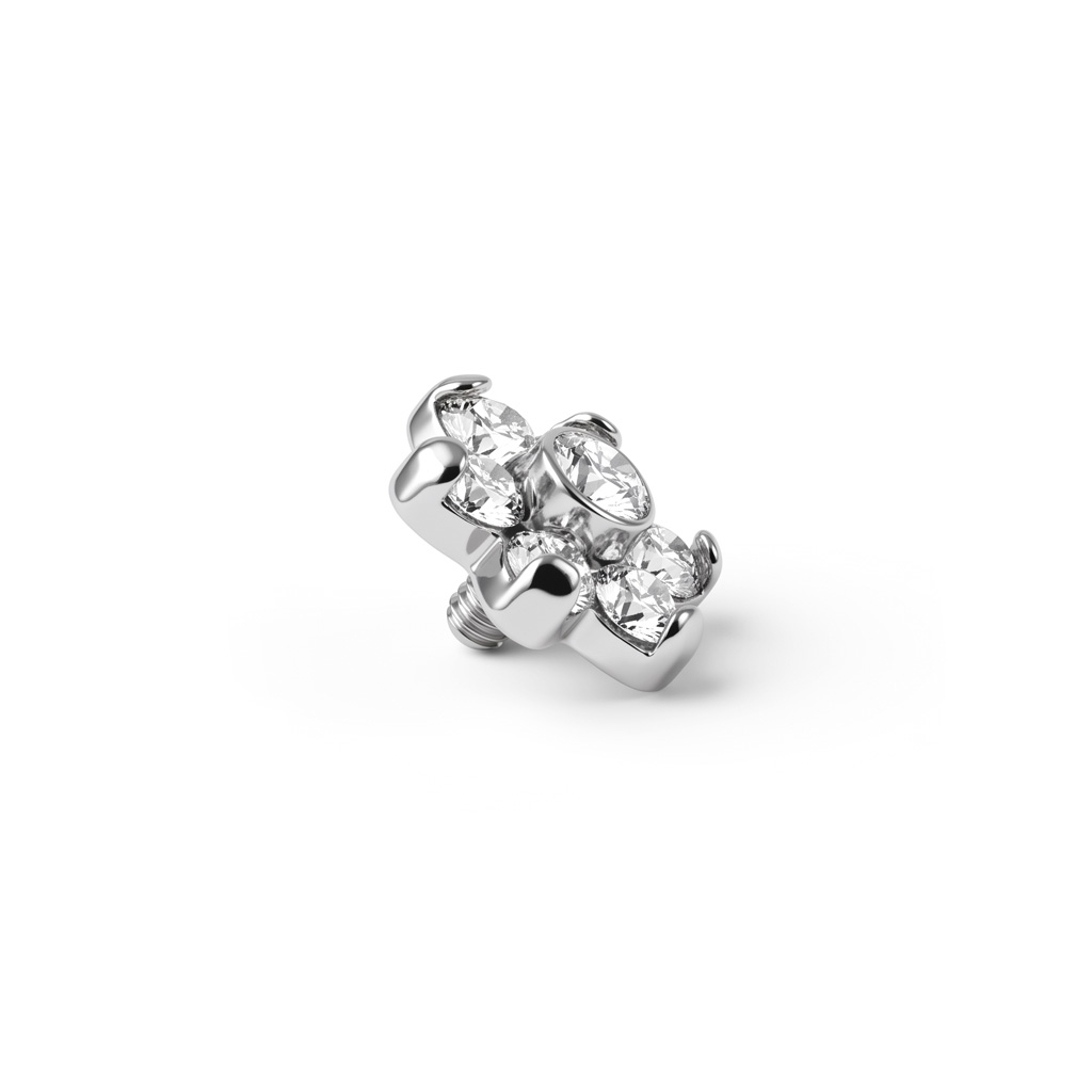 Dermal Anchor mit einer Blume geformt aus Steinen