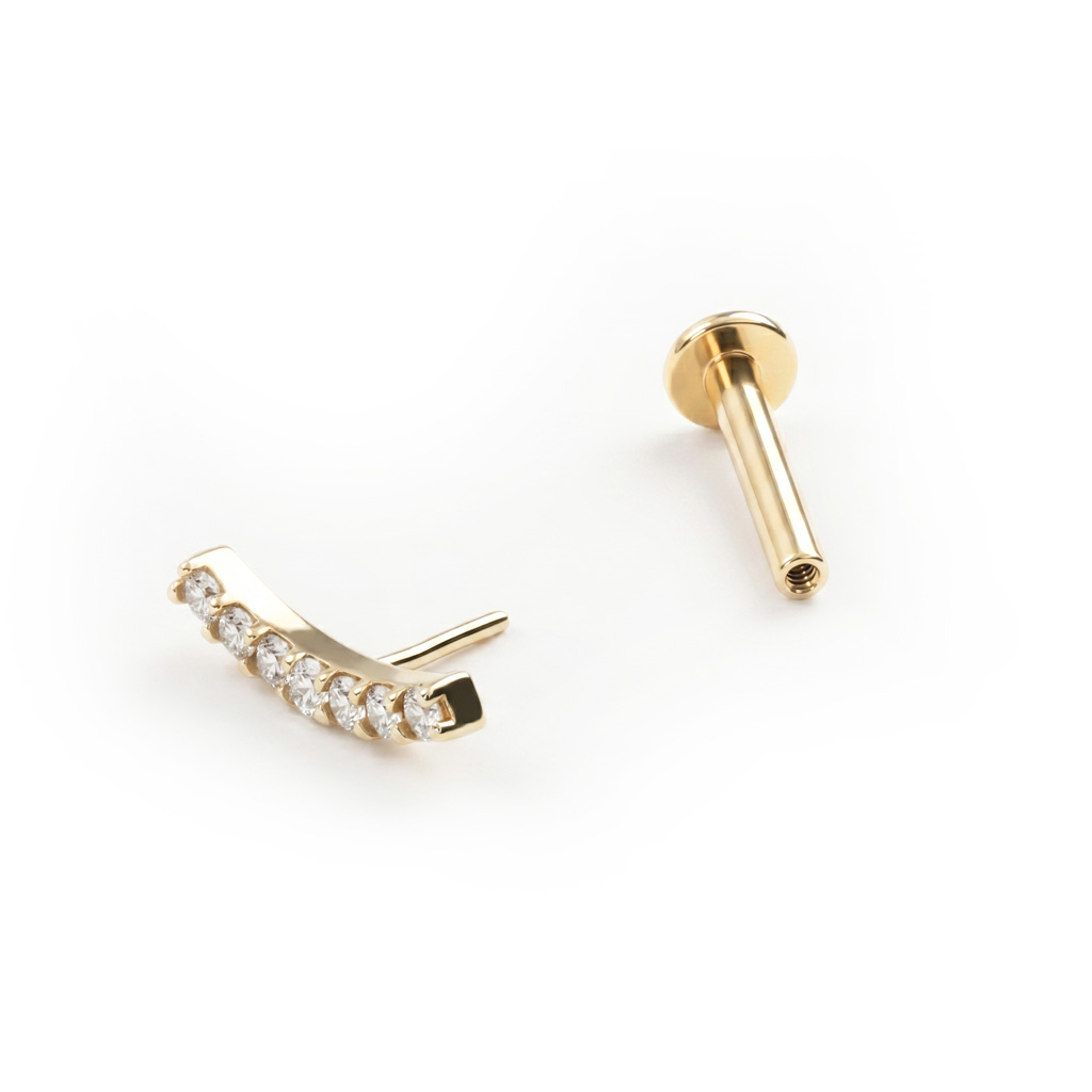 Bogenförmiges Push-in Labret aus 14k Gold mit Steinen