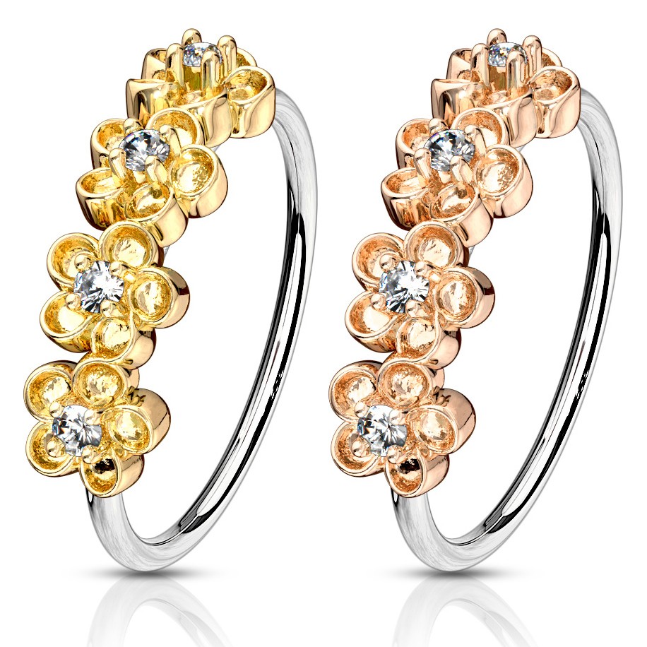 Ring mit vier Blumen auf der Seite