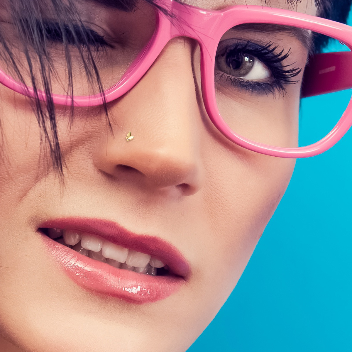 14 Karat Gold Nasenstecker mit einem Schmetterling